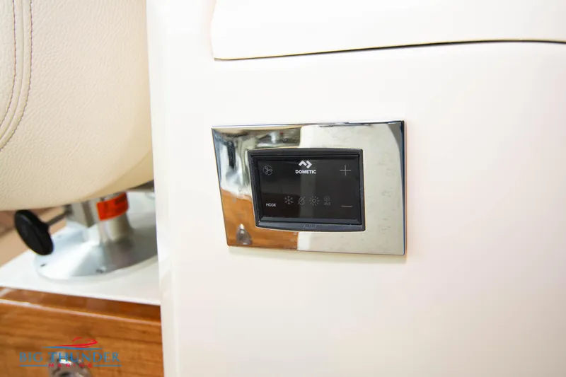 Slide: The Image of Control panel on 2024 Chris-Craft CALYPSO 35 CP boat interior. - 33