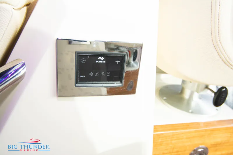 Slide: The Image of Control panel on the 2024 Chris-Craft CALYPSO 35 CP boat, Big Thunder Marine. - 34