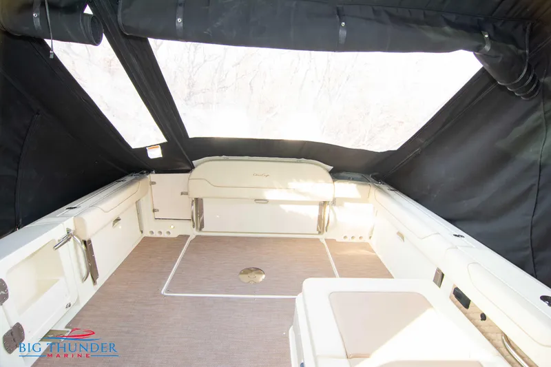 Slide: The Image of 2024 Chris-Craft CALYPSO 35 CP boat interior with seating and covered deck. - 36