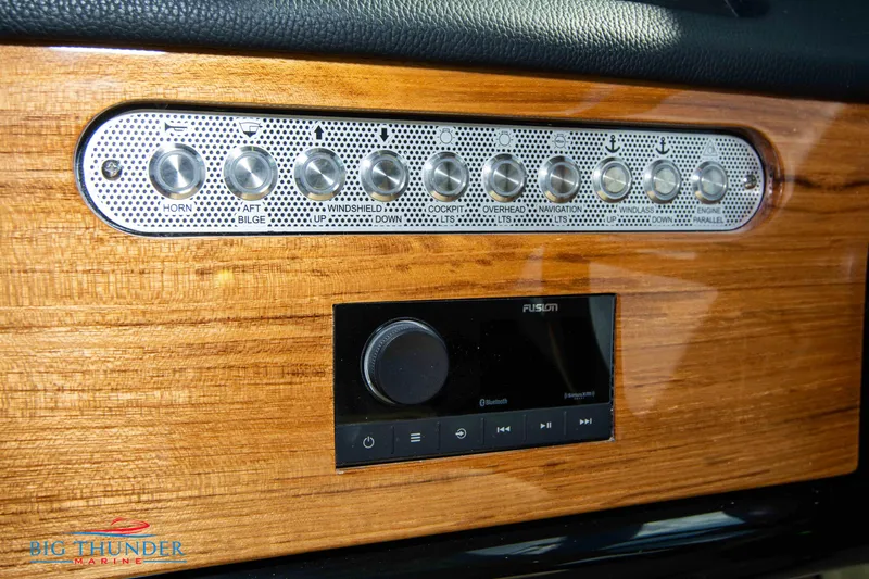 Slide: The Image of Control panel of 2024 Chris-Craft CALYPSO 35 CP boat with wood finish. - 43