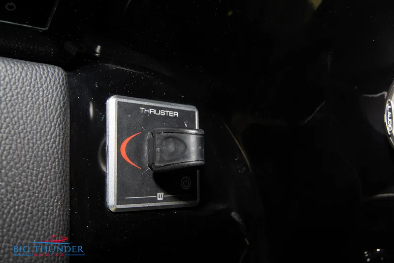 Slide: The Image of 2024 Chris-Craft CALYPSO 35 CP thruster control switch. - 45