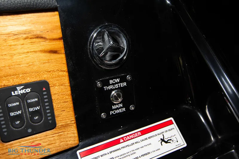 Slide: The Image of Control panel of 2024 Chris-Craft CALYPSO 35 CP with bow thruster and Lenco controls. - 46