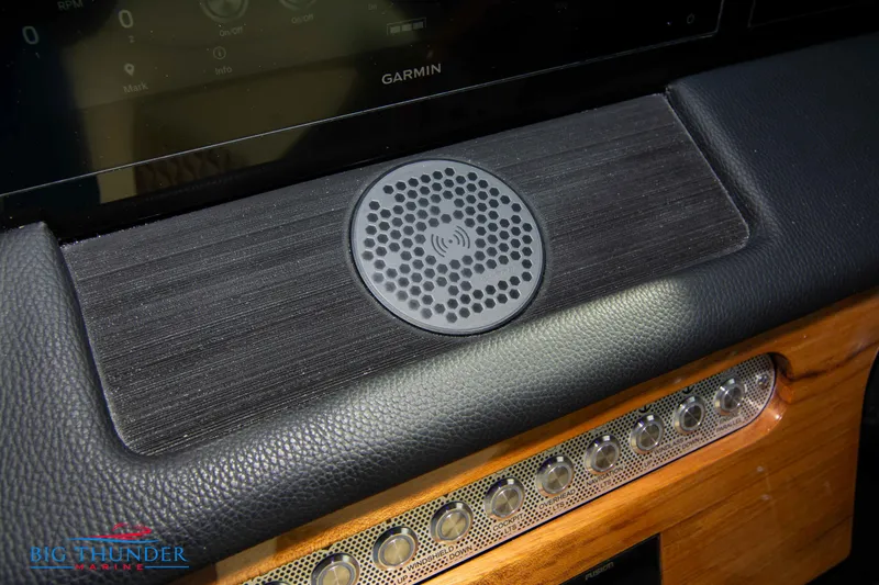 Slide: The Image of 2024 Chris-Craft CALYPSO 35 CP dashboard with Garmin display and speaker. - 47