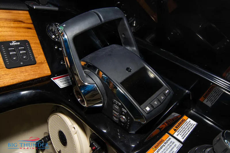 Slide: The Image of Control panel of 2024 Chris-Craft CALYPSO 35 CP boat with throttle and display. - 49