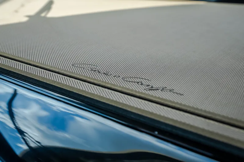 Slide: The Image of Close-up of 2024 Chris-Craft Calypso 35 boat deck with logo detail. - 42