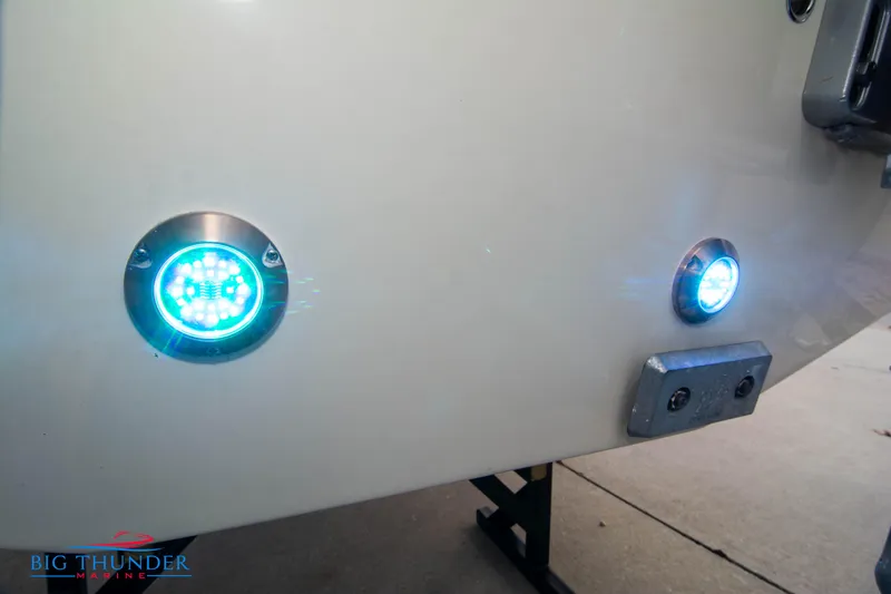 Slide: The Image of 2024 Chris-Craft CALYPSO 35 CP boat with illuminated underwater lights. - 9