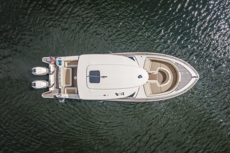 Slide: The Image of Aerial view of 2024 Chris-Craft Calypso 35 boat on water. - 3