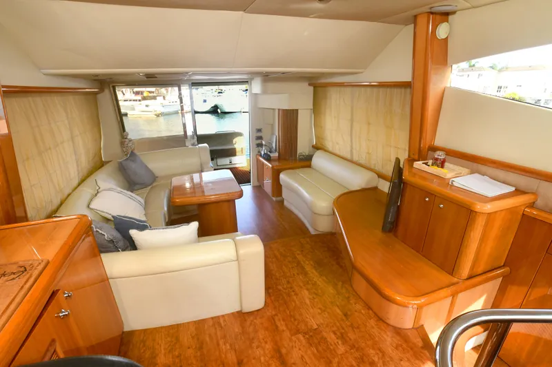 Slide: The Image of Luxurious interior of 2006 Sunseeker Manhattan 50 yacht with elegant seating and wooden finishes. - 10