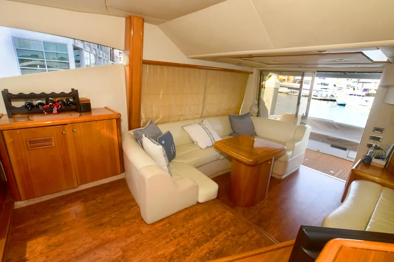 Slide: The Image of Luxurious interior of 2006 Sunseeker Manhattan 50 yacht with elegant seating and wooden finishes. - 11