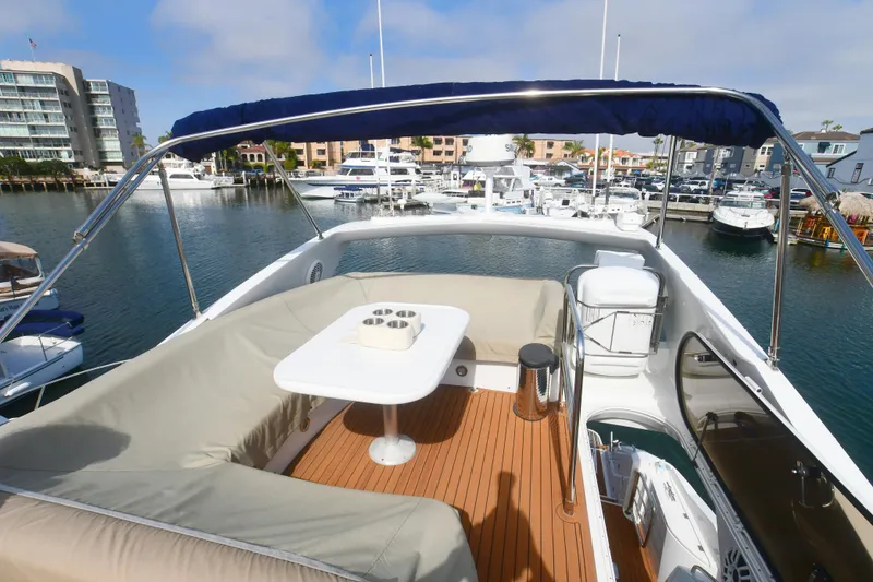 Slide: The Image of Flybridge view of 2006 Sunseeker Manhattan 50 yacht in marina setting. - 36