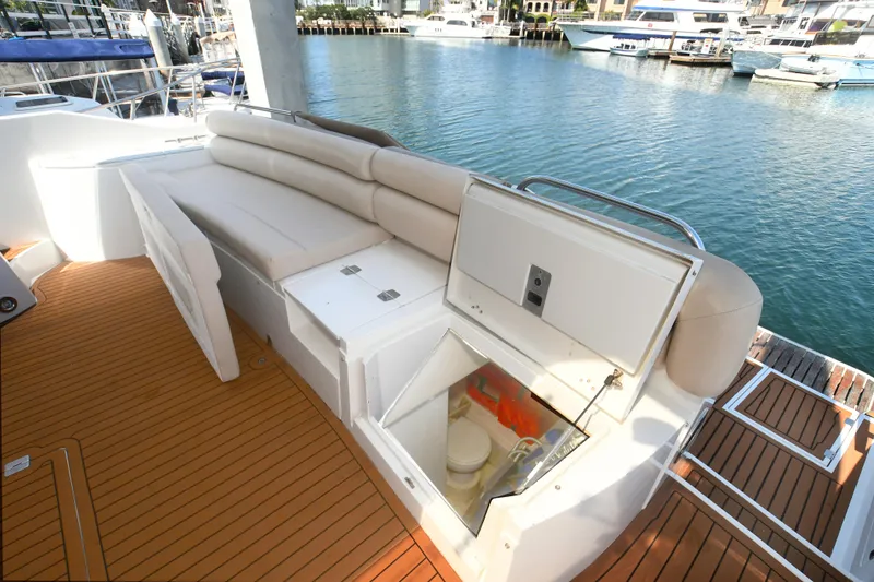 Slide: The Image of Luxury Sunseeker Manhattan 50 yacht deck with seating and storage, 2006 model. - 5
