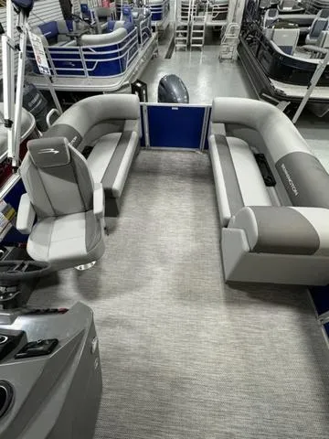 Slide: The Image of 2024 Bennington 20 SVSR boat interior storage compartment with accessories. - 12