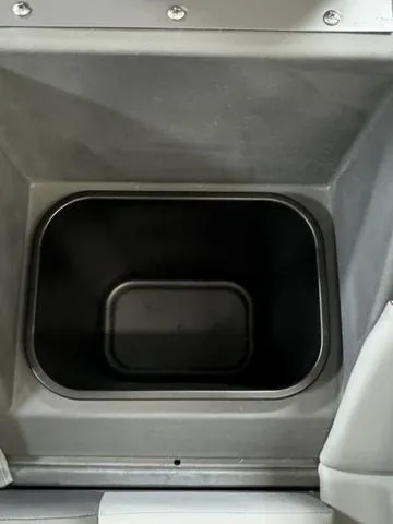Slide: The Image of 2024 Bennington 20 SVSR storage compartment, interior view. - 17