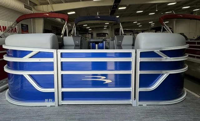 Slide: The Image of 2024 Bennington 20 SVSR boat interior with gray seating and Bennington logo. - 3