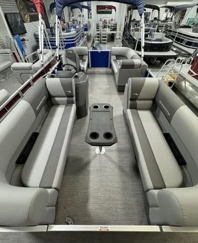 Slide: The Image of 2024 Bennington 20 SVSR pontoon boat interior with gray seating and modern design. - 9