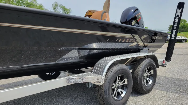 Slide: The Image of 2025 Xpress H20C Crappie boat with Yamaha Vmax 175 engine on trailer. - 10