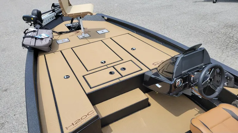 Slide: The Image of 2025 Xpress H20C Crappie boat with Yamaha Vmax 175, featuring spacious deck and modern controls. - 12