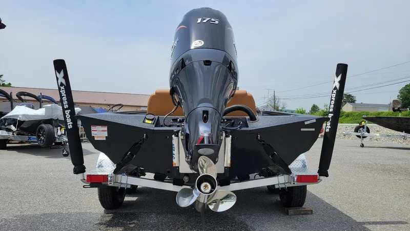 Slide: The Image of 2025 Xpress H20C Crappie boat with Yamaha Vmax 175 engine, rear view. - 4