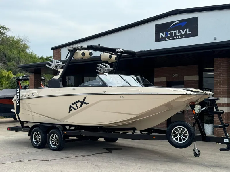 Slide: The Image of 2024 ATX Surf Boats 22 Type-S on trailer at NXT LVL Marine dealership. - 1