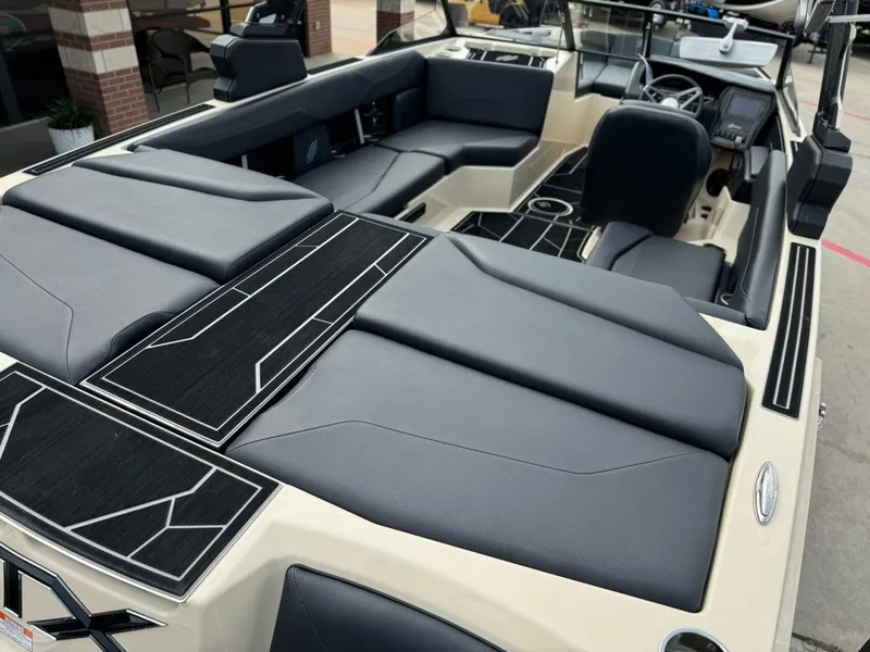 Slide: The Image of 2024 ATX Surf Boats 22 Type-S interior with sleek seating and modern dashboard design. - 15