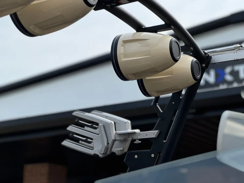 Slide: The Image of 2024 ATX Surf Boats 22 Type-S tower speakers and wakeboard rack close-up. - 17