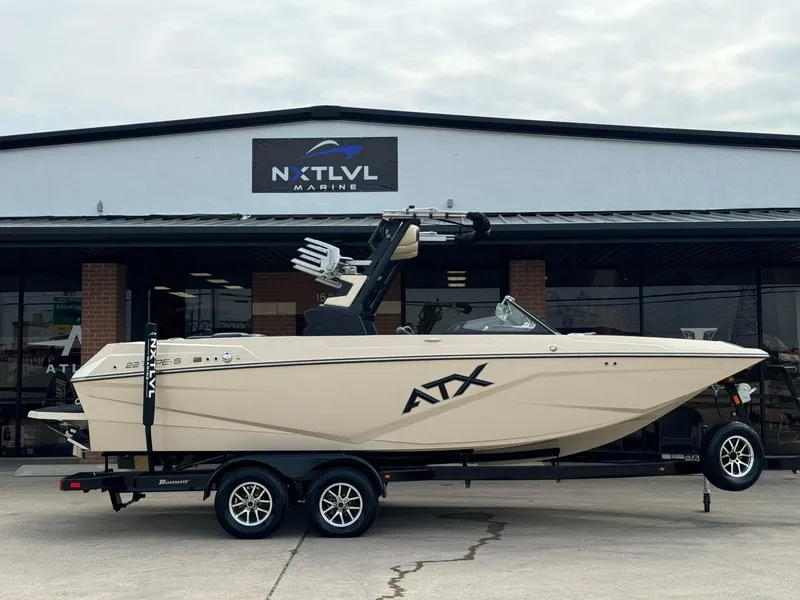 Slide: The Image of 2024 ATX Surf Boats 22 Type-S displayed at NXT LVL Marine dealership. - 2
