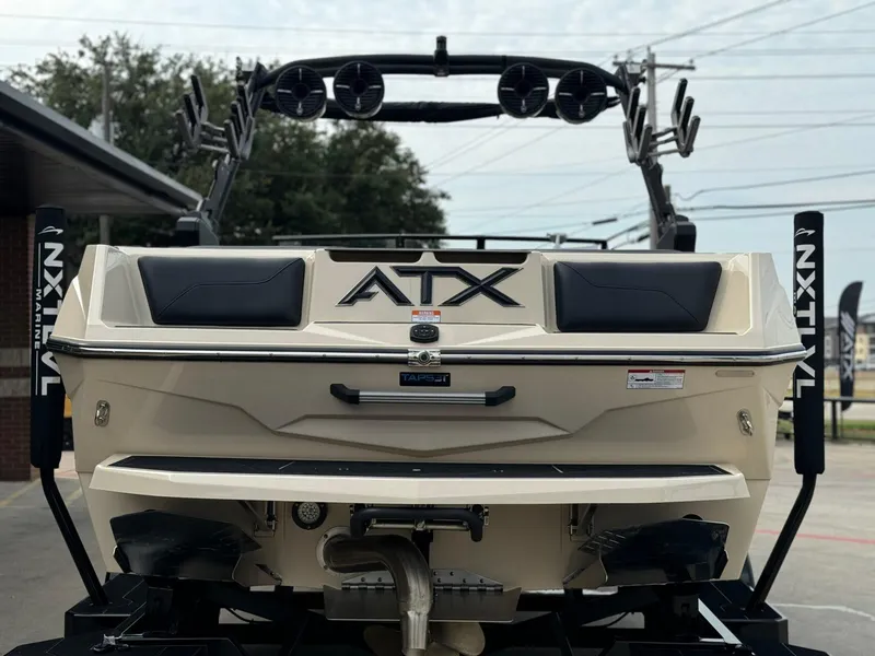 Slide: The Image of 2024 ATX Surf Boats 22 Type-S rear view with speakers and sleek design. - 4