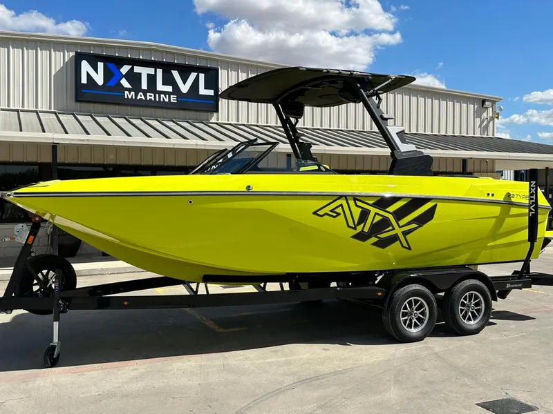Slide: The Image of 2024 ATX Surf Boats 22 Type-S in vibrant yellow at NXT LVL Marine. - 9
