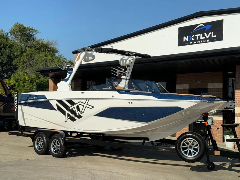 Slide: The Image of 2024 ATX Surf Boats 24 Type-S displayed at NXT LVL Marine dealership. - 1