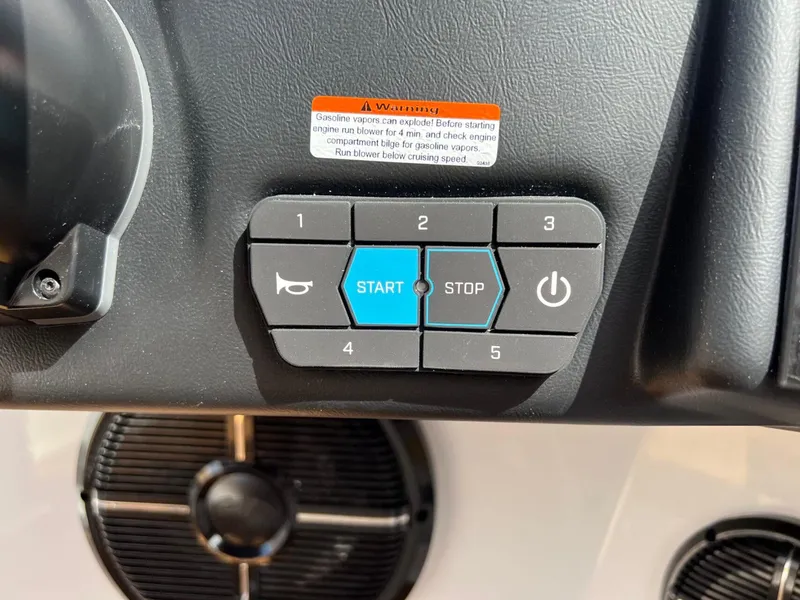 Slide: The Image of Control panel of 2024 ATX Surf Boats 24 Type-S with start and stop buttons. - 13