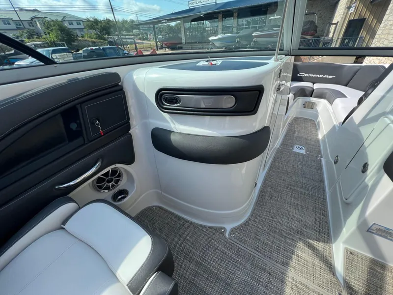 Slide: The Image of 2024 Crownline 270 SS boat interior with modern seating and sleek design. - 10
