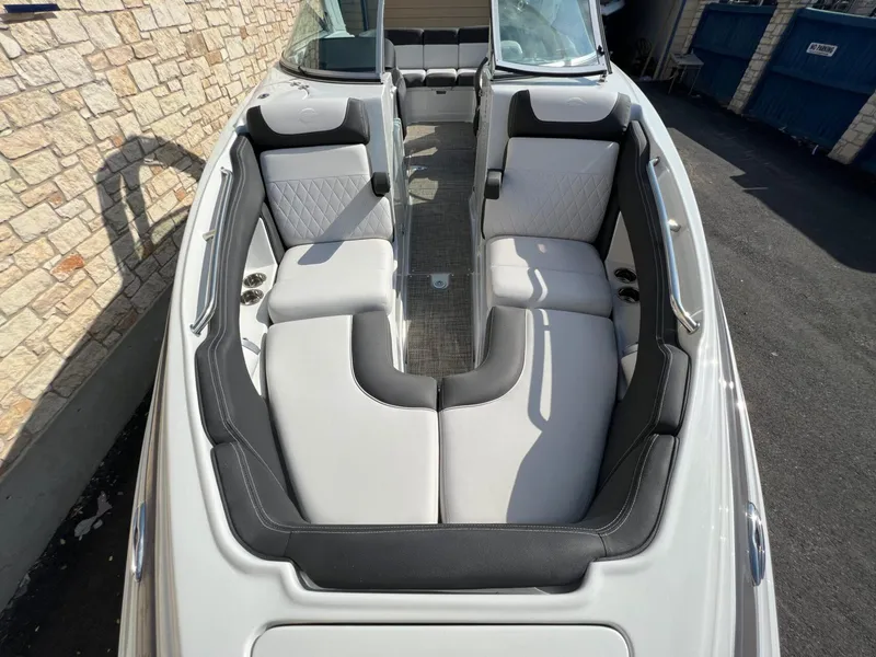 Slide: The Image of 2024 Crownline 270 SS boat interior with luxurious seating and modern design. - 12
