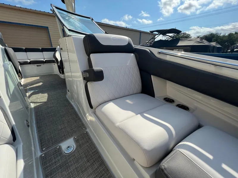 Slide: The Image of 2024 Crownline 270 SS boat interior with luxurious seating and modern design. - 13