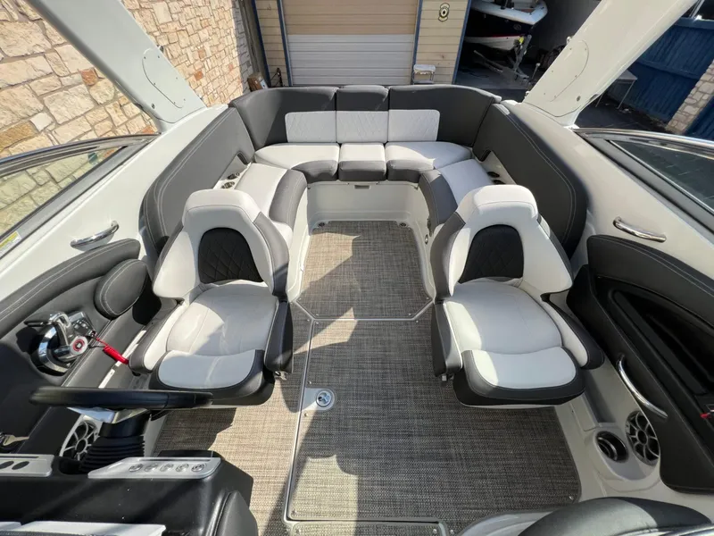 Slide: The Image of 2024 Crownline 270 SS boat interior with luxurious seating and modern design. - 14