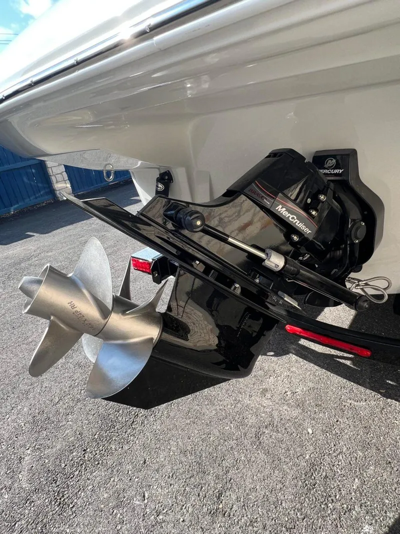 Slide: The Image of 2024 Crownline 270 SS boat with MerCruiser engine and stainless steel propeller. - 4