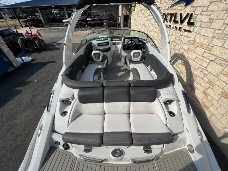 Slide: The Image of 2024 Crownline 270 SS boat interior with sleek seating and modern design. - 5