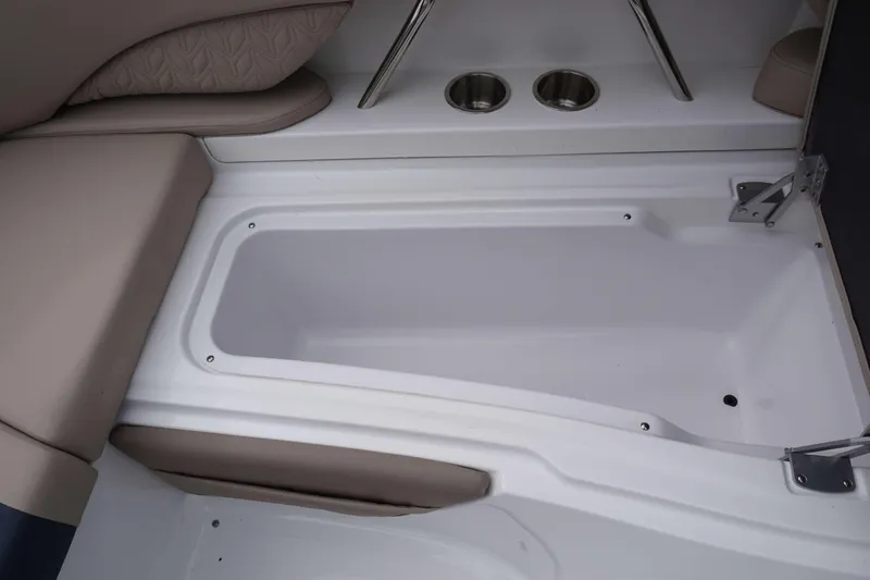 Slide: The Image of Interior seating and storage compartment of 2024 Hurricane 2600 SD boat. - 7