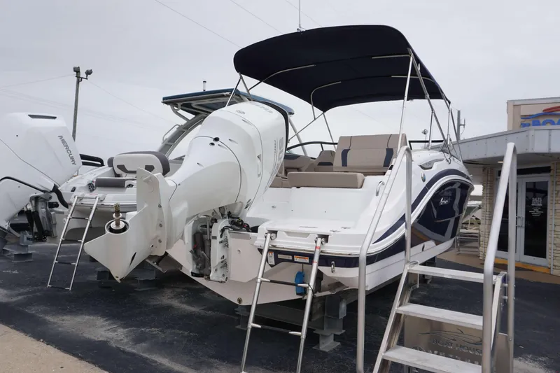 Slide: The Image of 2024 Hurricane 2600 SD boat with Mercury outboard engine on display. - 9