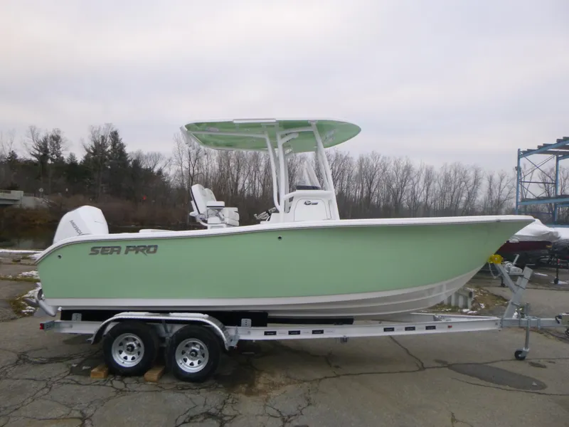 The Image of 2024 Sea Pro 222 Center Console boat on a trailer, side view. - 0