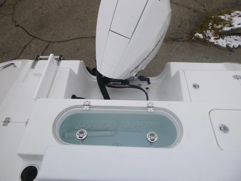 Slide: The Image of 2024 Sea Pro 222 Center Console boat with outboard motor and livewell. - 19
