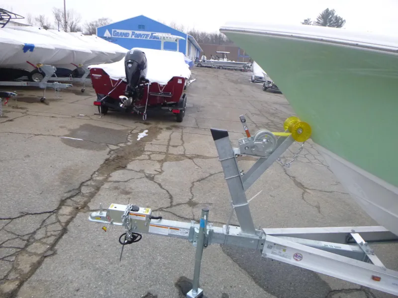 Slide: The Image of 2024 Sea Pro 222 Center Console boat on a trailer in a boatyard. - 20