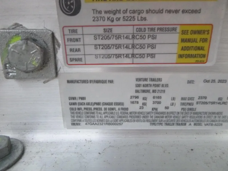 Slide: The Image of 2024 Sea Pro 222 Center Console trailer tire pressure and weight specifications label - 21