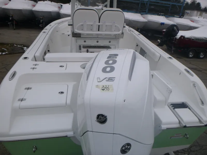 Slide: The Image of 2024 Sea Pro 222 Center Console boat with 200 V6 engine, rear view. - 5
