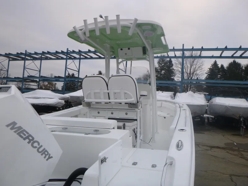 Slide: The Image of 2024 Sea Pro 222 Center Console boat with Mercury engine in storage yard. - 6
