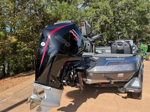 Slide: The Image of 2024 Ranger Z521R Ranger Cup Equipped boat with powerful outboard motor. - 7