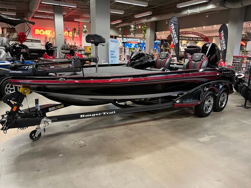 Slide: The Image of 2024 Ranger Z520R Ranger Cup Equipped bass boat on display indoors. - 0