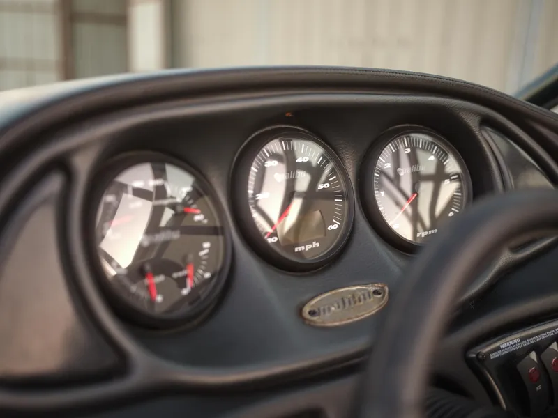 Slide: The Image of Close-up of 2003 Malibu Sunscape 21 LSV boat dashboard gauges. - 29