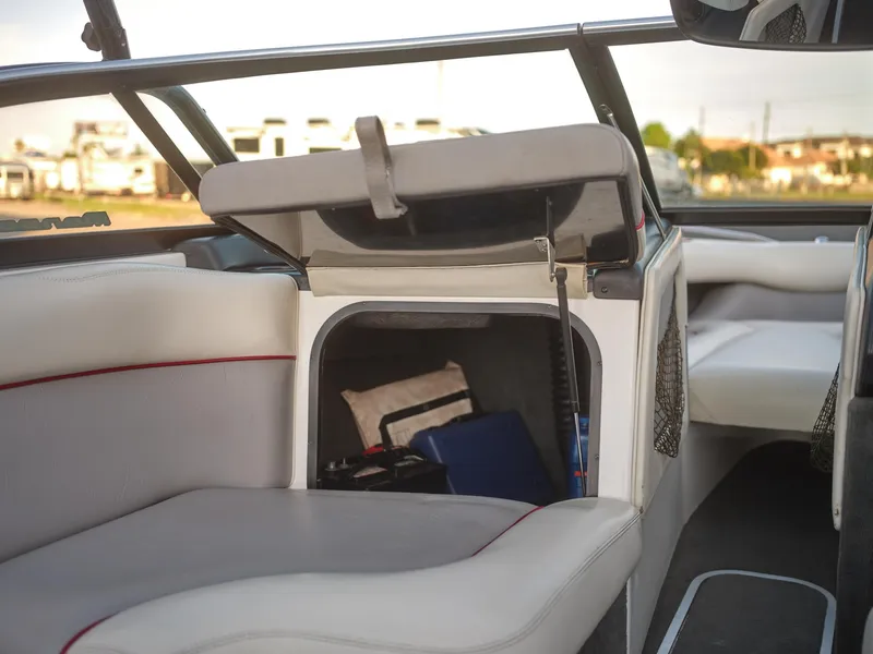 Slide: The Image of Interior storage compartment of a 2003 Malibu Sunscape 21 LSV boat. - 35