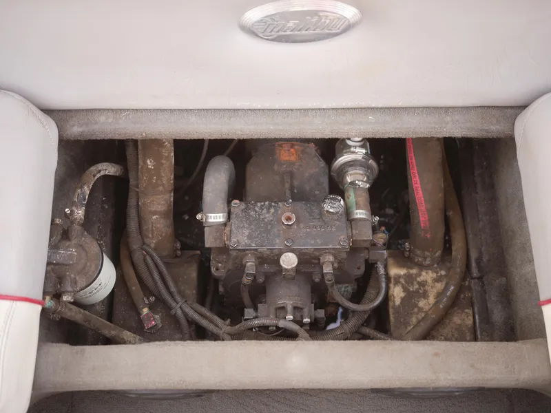 Slide: The Image of 2003 Malibu Sunscape 21 LSV boat engine compartment with visible components. - 37