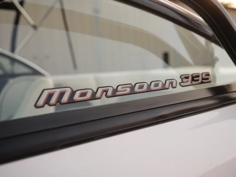 Slide: The Image of Close-up of Monsoon 335 logo on 2003 Malibu Sunscape 21 LSV boat. - 42